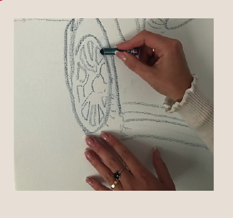 Tanja Stadnic drawing the first lines of a commissioned Porsche painting